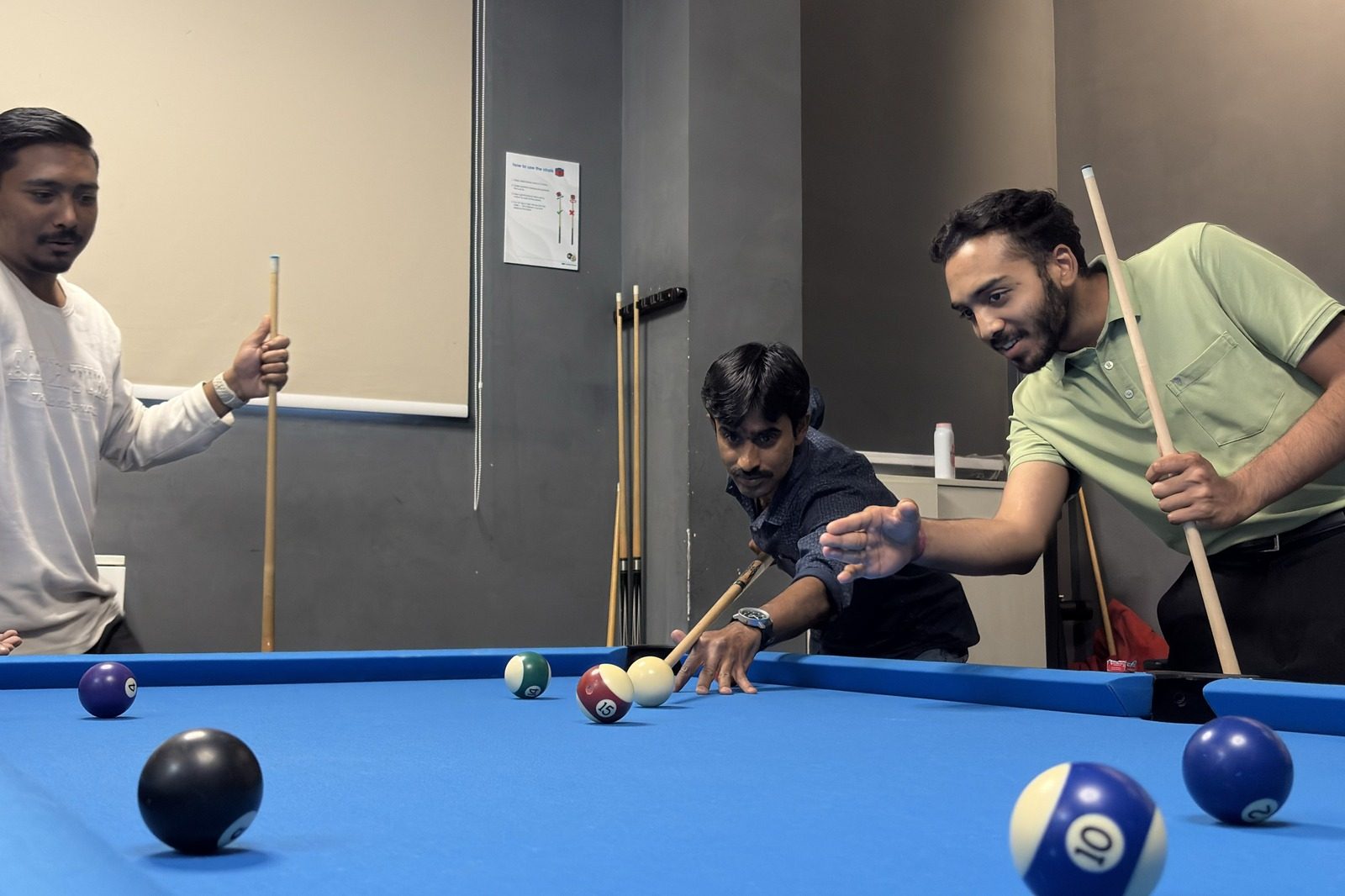 WaterScience team playing pool together