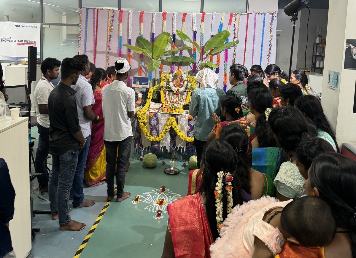 Team sharing a traditional Onam meal together